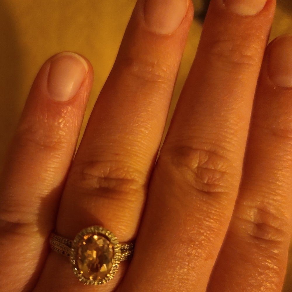 Roger's and Hollands rose gold moissanite ring
